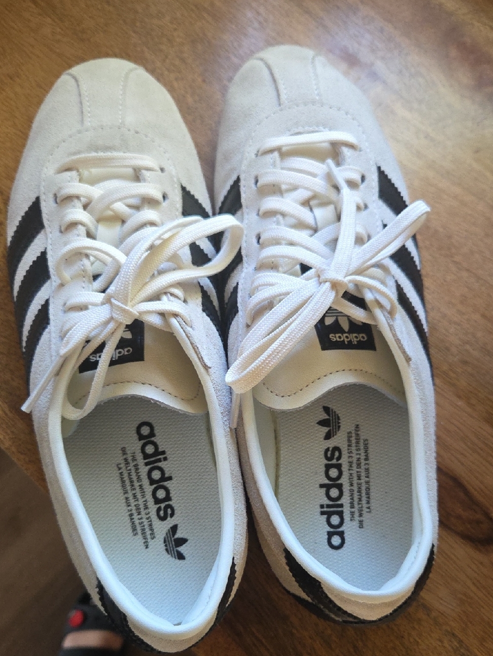 adidas Men’s White Sneakers with Black Stripes